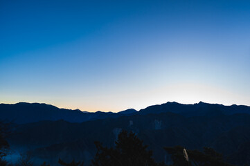 Breathtaking sunrise vista from Alishan Mountain, Taiwan. The Alishan National Scenic Area is a mountain retreat and nature reserve situated in Alishan Township, Chiayi County, Taiwan.