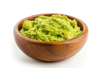 Guacamole dip sauce in wooden bowl on white background
