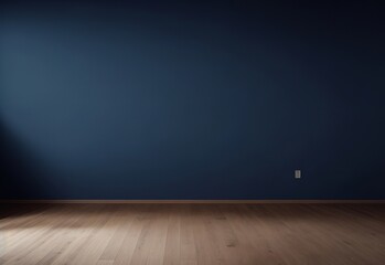 Dark blue wall in an empty room with a wooden floor
