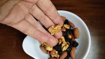 person holding a cereals 