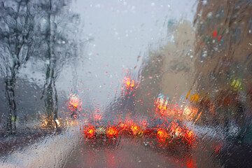Poor visibility through the windshield in rain and snow, Munich, Bavaria, Germany, Europe - obrazy, fototapety, plakaty