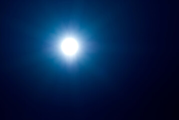 Sun in the dark blue sky