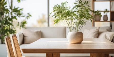Living room with wooden table and plant decorations.