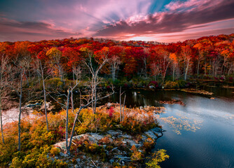 Beautiful fall Forest Lake at sunset