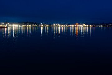Port Lights on the water at night