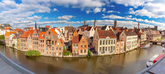 Fototapeta premium Panoramic aerial view of quay Graslei, Leie river and towers of Old Town, Ghent, Belgium
