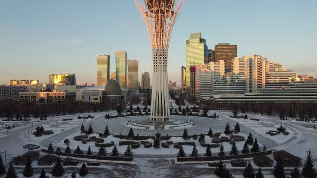 Drone flight above Astana city center with skyscrapers and Baiterek Tower. Capital of Kazakhstan, Qazaqstan.