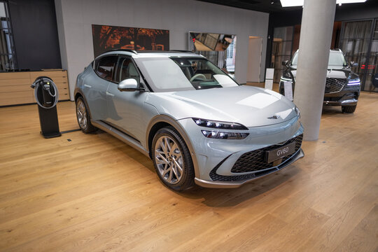 new Genesis GV60 Electric Car, all-electric SUV korean brand Hyundai company in showroom, EV in Europe, Eco-Friendly Innovation in automotive industry show in Frankfurt, Germany - January 31, 2024