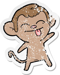 distressed sticker of a funny cartoon monkey