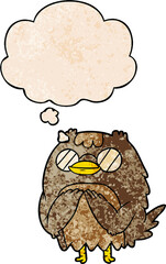 cartoon wise old owl and thought bubble in grunge texture pattern style