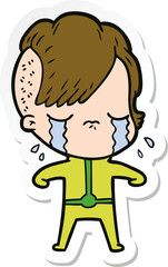 sticker of a cartoon crying girl