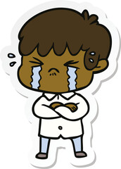 sticker of a crying boy cartoon