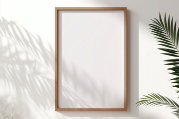 Wooden frame mockup on white wall. Poster mockup. Clean, modern, minimal frame. Indoor interior