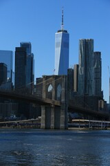 New York watertaxi with Brooklyn Bridge and freedom tower