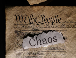 US Constitution with Chaos news headline