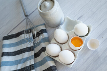 eggs ready for cooking on light kitchen table, hight key