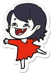 sticker of a cartoon laughing vampire girl