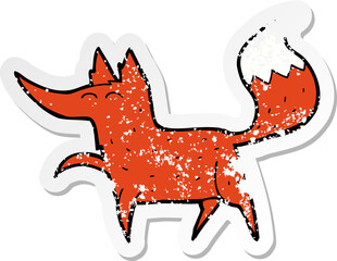 distressed sticker of a cartoon fox