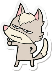 sticker of a cartoon annoyed wolf
