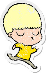 distressed sticker of a cartoon calm boy
