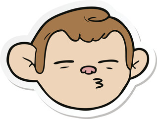 sticker of a cartoon monkey face