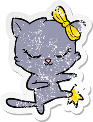 distressed sticker of a cute cartoon cat with bow