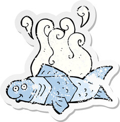 retro distressed sticker of a cartoon funny fish