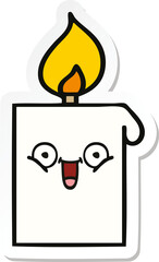 sticker of a cute cartoon lit candle