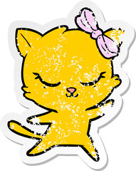 distressed sticker of a cute cartoon cat with bow