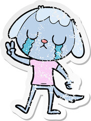 distressed sticker of a cute cartoon dog crying
