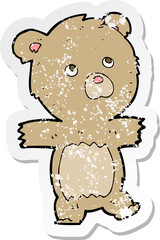 retro distressed sticker of a cartoon cute teddy bear