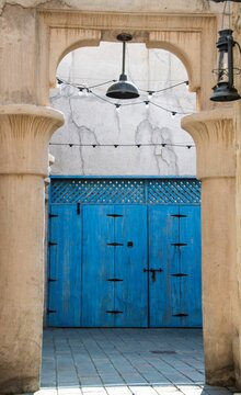 closed blue door on a building in the historic Arabic district Al Fahid in Dubai