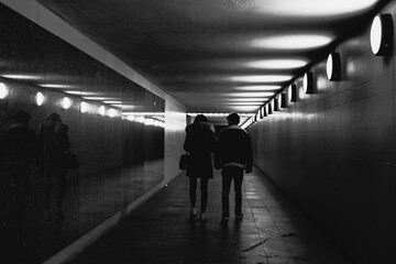 couple in an underground passage