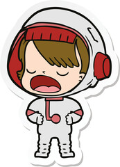 sticker of a cartoon talking astronaut