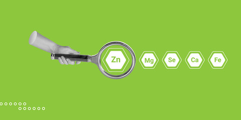 Zinc concept. Search for products or dietary supplements high in Zinc. Hand with a magnifying glass...