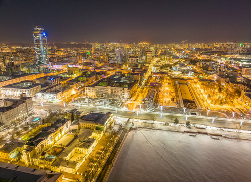 Embankment of the central pond and Plotinka in Yekaterinburg at winter sunset. The historic center of the city of Yekaterinburg, Russia, Aerial View