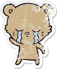 distressed sticker of a crying cartoon bear