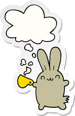 cute cartoon rabbit drinking coffee and thought bubble as a printed sticker