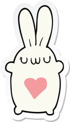 sticker of a cute cartoon rabbit with love heart