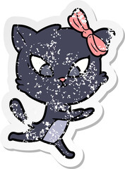 distressed sticker of a cartoon cat