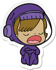 sticker of a cartoon talking astronaut