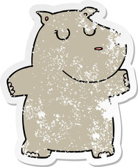 distressed sticker of a cartoon hippo