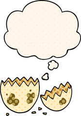cartoon cracked egg and thought bubble in comic book style