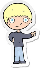 sticker of a cartoon happy boy pointing
