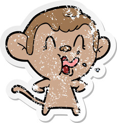 distressed sticker of a crazy cartoon monkey