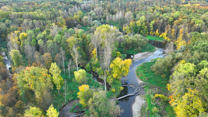Autumn river delta floodplain fall color meander drone aerial inland video shot in sandy sand...