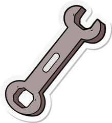 sticker of a cartoon spanner