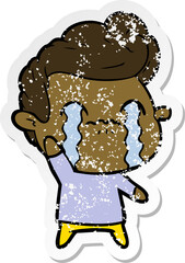 distressed sticker of a cartoon man crying