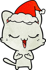 happy textured cartoon of a cat wearing santa hat