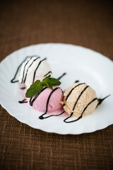 Turkish borek rolls with spinach and cheese on the white plate. A traditional Turkish pastry, Turkish name; rulo borek or sigara boregi.